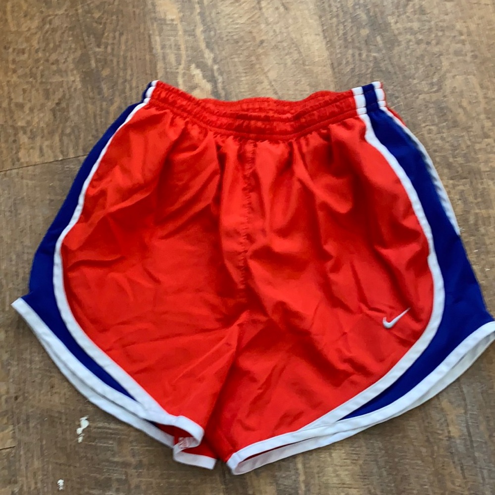 Red White and blue nike running shorts
